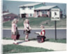 1950s Twin Girls and Boy On Sidewalk By School by Anonymous