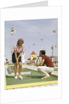 1950s 1960s Young Couple Man Woman Play Miniature Golf Summer Amusement by Anonymous