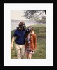 1970s Young Romantic Teenage Couple Man Woman Wearing Gas Masks Walking By River by Anonymous