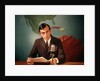 1960s Reporter Reading News Into Microphone With Global Map In Background by Anonymous