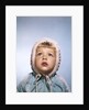 1960s Cold Little Girl In Winter Coat And Hood Looking Up At Falling Snow by Anonymous