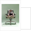 1970s Businessman Chimpanzee Sitting In Office Chair by Anonymous