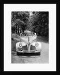 1940s 1941 Couple Man And Woman In Pontiac Convertible Driving On Country Lane In Countryside by Anonymous