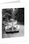 1940s 1941 Couple Man And Woman In Pontiac Convertible Driving On Country Lane In Countryside by Anonymous