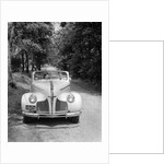 1940s 1941 Couple Man And Woman In Pontiac Convertible Driving On Country Lane In Countryside by Anonymous