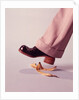 1970s Man About To Slip On Banana Peel by Anonymous