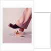1970s Man About To Slip On Banana Peel by Anonymous