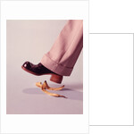 1970s Man About To Slip On Banana Peel by Anonymous