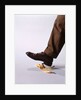 1970s Male Foot About To Step On Banana Peel by Anonymous