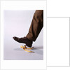 1970s Male Foot About To Step On Banana Peel by Anonymous