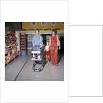 1970s Two Women Small Girl Walking Down Supermarket Grocery Store Aisle Woman Pushing Cart by Anonymous