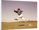 1960s Jumping Running Man Football Player by Anonymous