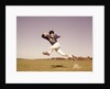1960s Jumping Running Man Football Player by Anonymous