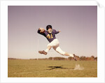 1960s Jumping Running Man Football Player by Anonymous