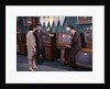1960s Couple Man Woman Talking To Salesman In Color Television Set Sales Department by Anonymous
