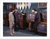 1960s Couple Man Woman Talking To Salesman In Color Television Set Sales Department by Anonymous