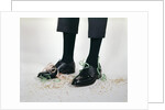 1960s Humor Story Close-Up Detail Of Man's Legs With Pants Too Short And Confetti On Shoes Man by Anonymous