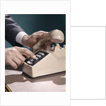 1960s 1970s Man Hands Businessman Salesman Dialing Touch Tone Telephone by Anonymous