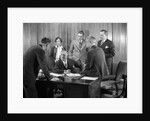 1930s Worried Business Group In Office Meeting Around The Boss' Desk by Anonymous