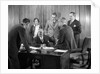 1930s Worried Business Group In Office Meeting Around The Boss' Desk by Anonymous