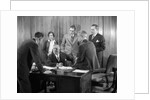 1930s Worried Business Group In Office Meeting Around The Boss' Desk by Anonymous