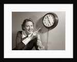 1950s Woman Holding Steno Pad Pointing With Pencil To Clock 5 Minutes Till Quitting Time by Anonymous