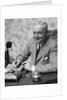 1920s 1930s Man Businessman,Salesman Sitting At Desk Smoking Cigar Writing A Memo by Anonymous