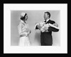 1930s 1940s Woman Nurse Talking With Man Proud New Father Holding Newborn Twin Babies by Anonymous
