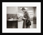 1950s 1960s Woman Handbag On Arm Gloves Filling Out Deposit Slip Bank Counter by Anonymous