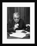 1930s Head-On Serious Senior Businessman Behind Desk Hand On Telephone Pointing by Anonymous
