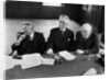 1930s 1940s Elderly Businessmen Sitting At Conference Table With Attention Directed To Speaker Not Shown by Anonymous