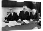 1930s 1940s Elderly Businessmen Sitting At Conference Table With Attention Directed To Speaker Not Shown by Anonymous