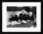 1930s 1940s Elderly Businessmen Sitting At Conference Table With Attention Directed To Speaker Not Shown by Anonymous