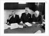 1930s 1940s Elderly Businessmen Sitting At Conference Table With Attention Directed To Speaker Not Shown by Anonymous