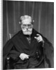 1930s Stern Elderly Judge With Beard And Glasses Pointing At Camera by Anonymous