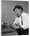 1960s Reporter With Hat On Phone At Typewriter by Anonymous