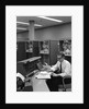 1960s Man In Shirt and Tie and Glasses At Control Console For Ibm Data Processing Systm by Anonymous