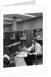 1960s Man In Shirt and Tie and Glasses At Control Console For Ibm Data Processing Systm by Anonymous