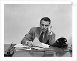 1940s Tired Overworked Man Businessman Leaning On Elbow Looking At Camera by Anonymous