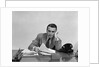 1940s Tired Overworked Man Businessman Leaning On Elbow Looking At Camera by Anonymous