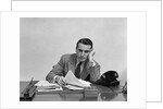 1940s Tired Overworked Man Businessman Leaning On Elbow Looking At Camera by Anonymous