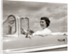 1950s Woman Driving Chevrolet Convertible Automobile by Anonymous