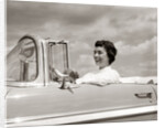 1950s Woman Driving Chevrolet Convertible Automobile by Anonymous