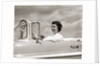 1950s Woman Driving Chevrolet Convertible Automobile by Anonymous