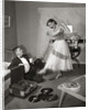 1950s 1960s Teen Couple Dressed for Prom, Girl Dancing To Music From A Record Player by Anonymous
