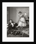 1950s 1960s Teen Couple Dressed for Prom, Girl Dancing To Music From A Record Player by Anonymous