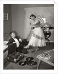 1950s 1960s Teen Couple Dressed for Prom, Girl Dancing To Music From A Record Player by Anonymous