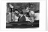 1950s Family Father Mother Daughter Son In Convertible Reading Map by Anonymous