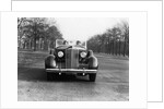 1930s 1935 Couple Driving Packard Convertible Automobile by Anonymous