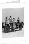 1920s 1930s Four Women In Dresses And Bathing Suits Gathered Around Convertible Touring Car At Seashore by Anonymous